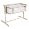 The HALO 2-in-1 Bedside BassiNest Sleeper is a beige and white bassinet with breathable mesh sides, adjustable height, a sturdy metal frame, and a drop-down side panel for easy access.