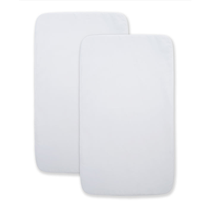 Two white, rectangular HALO 2-in-1 Bedside Bassinet Sleeper Fitted Sheets (2 Pack), made from 100% organic cotton, with rounded corners—ideal for pairing with custom or HALO BassiNest sheets.
