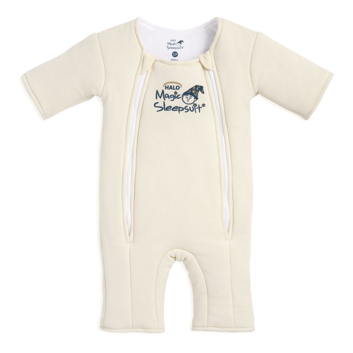 The HALO Baby Merlin's Magic Sleepsuit® 100% Cotton is a cream baby sleep suit with long sleeves and legs, dual front zippers, and a sleeping moon logo—ideal for swaddle transition.