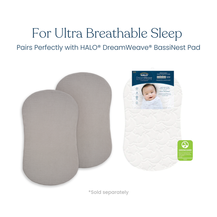 Two gray oval pads (HALO BassiNest® Fitted Sheet 100% Organic Cotton Muslin 2-Pack) are shown next to a white quilted bassinet pad with a baby’s photo on the packaging. Text reads: "For Ultra Breathable Sleep. Pairs perfectly with DreamWeave BassiNest Pad.