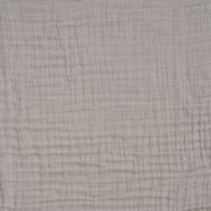 A close-up of the HALO BassiNest® Fitted Sheet 100% Organic Cotton Muslin 2-Pack shows light gray, textured muslin with a subtle crisscross pattern and visible threads—ideal for breathable crib sheets.