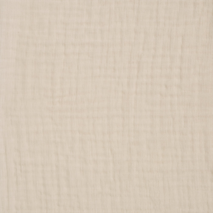 Close-up of the HALO BassiNest® Fitted Sheet 100% Organic Cotton Muslin 2-Pack in beige, featuring a subtle grid texture and soft, breathable feel—perfect for your nursery.