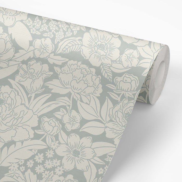 Blooming Wallpaper in Cloudy Blue on a roll of wallpaper