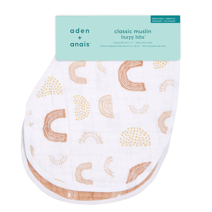 A set of aden + anais boutique 100% cotton muslin burpy bibs, featuring breathable and versatile full coverage with beige and brown abstract patterns.