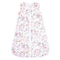 The aden + anais boutique 100% cotton muslin light sleep sack TOG 1.0 features a white sleeveless design with a pink, orange, and green floral pattern. It is crafted from breathable cotton muslin and includes a front zipper for comfort and style.