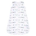 The aden + anais Boutique sleep sack is a lightweight, sleeveless design made from 100% cotton muslin. It features a front zipper closure and is decorated with blue, turquoise, and gray dinosaurs for ultimate comfort. TOG rating: 1.0.