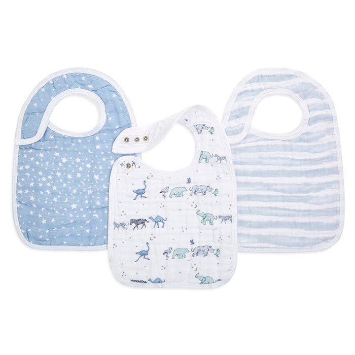 Aden + anais boutique 100% cotton muslin snap bibs come in a 3-pack featuring designs with white stars on blue, pastel animal and people patterns on white, and blue and white stripes. Each bib is absorbent and adjustable for a comfortable fit.