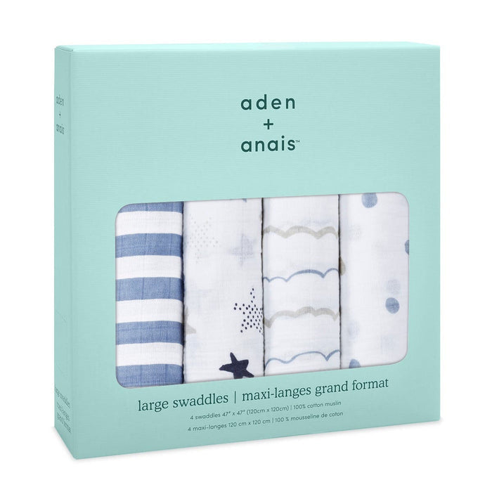 A turquoise box of aden + anais boutique 100% cotton muslin swaddle blankets includes four designs: blue stripes, white with blue dots, beige with grey stripes, and white with stars. These large, breathable swaddles offer extra absorbency.