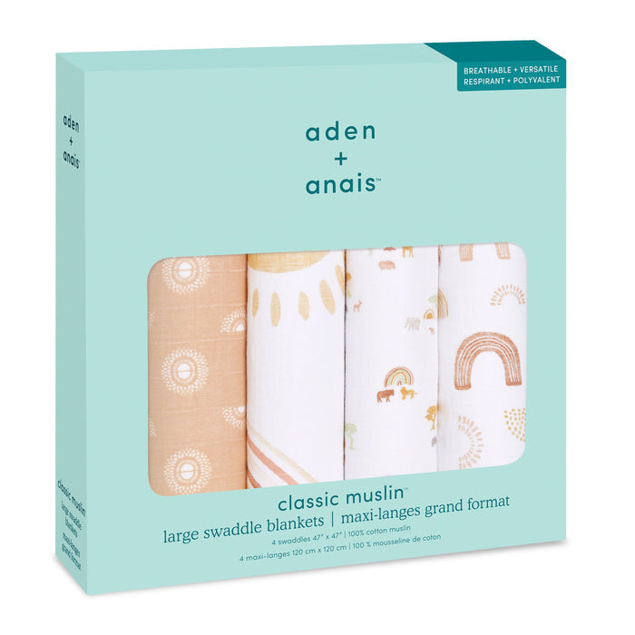 The aden + anais boutique 100% cotton muslin swaddle blanket 4 pack features four large, breathable, absorbent blankets in soft, earthy prints visible through the packaging, ideal for versatile use.