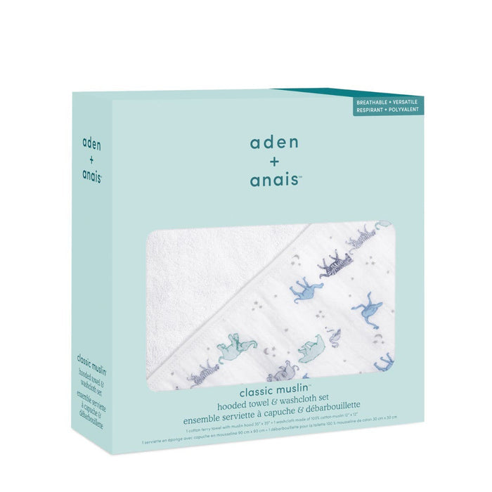 The aden + anais boutique set includes a 100% cotton oversized muslin-backed towel and washcloth. Its boxed in turquoise packaging with blue and green playful animal designs, adding charm to bath time.