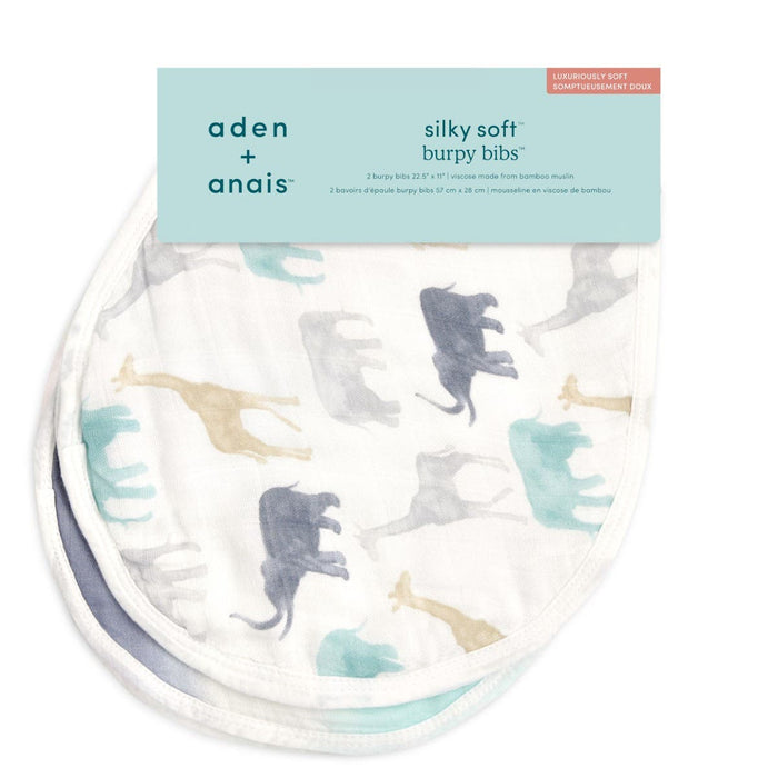 A pack of aden + anais boutique silky soft burpy bibs, featuring extra absorbent fabric with elephant and giraffe patterns in muted gray, blue, and beige on soft white fabric, is displayed against a white background with the packaging label visible.