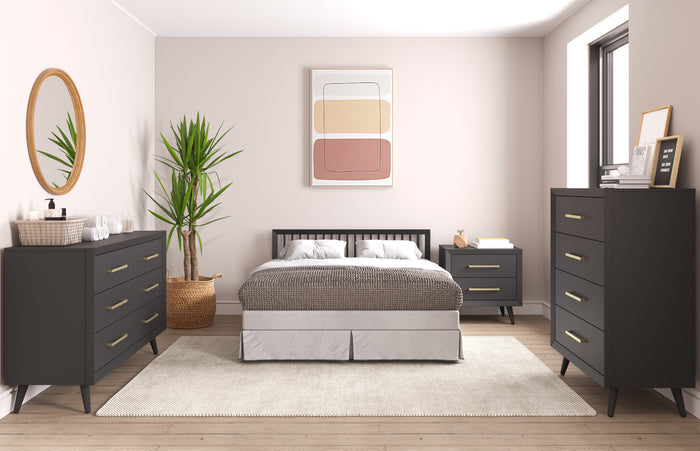 Modern bedroom with a black bed frame, gray bedding, black dressers, round mirror, potted plant, abstract wall art, large window, and light rug on wood floors, featuring the Child Craft Cranbrook Nightstand in Ebony for a neutral, minimalist look.