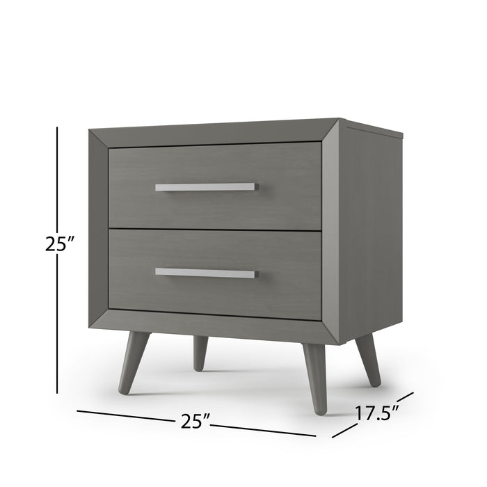 The Child Craft Cranbrook Nightstand in Lunar Gray features two drawers with silver handles, angled legs, and measures 25"H x 25"W x 17.5"D.