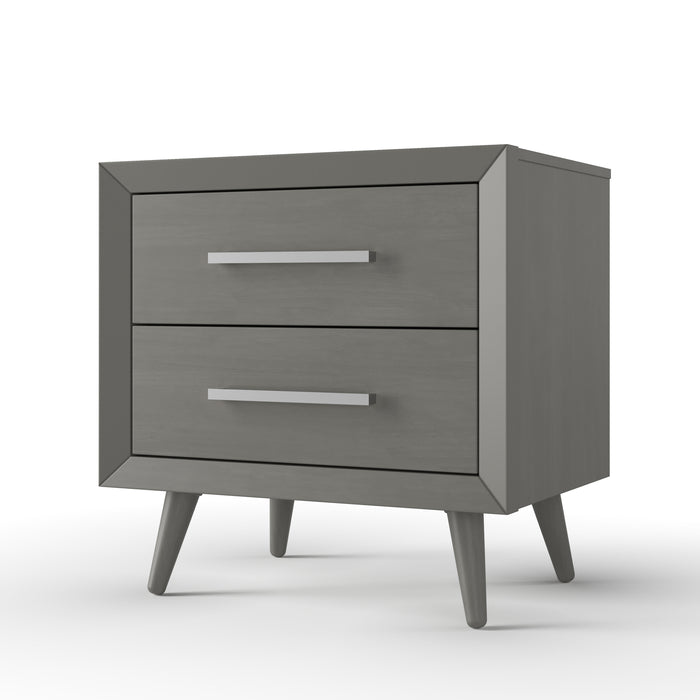 The Child Craft Cranbrook Nightstand in Lunar Gray features two drawers with sleek metal handles and four angled legs, displayed on a white background.