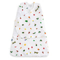 The HALO Eric Carle The Very Hungry Caterpillar 100% Cotton Swaddle TOG 1.5 features colorful caterpillar and fruit prints, a zippered front, and overlapping flaps for a cozy and secure sleep.
