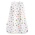 The HALO Eric Carle The Very Hungry Caterpillar 100% Cotton Wearable Blanket TOG 0.5 is a white sleep sack with colorful food, animal, and sun prints, inspired by the classic storybook, and features a handy front zipper.