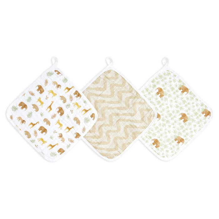 The aden + anais essential cotton muslin washcloths 3 pack features three designs: safari animals, zigzags, and bears with leaves. Made with absorbent layers and hanging loops, they are ideal for delicate skin.