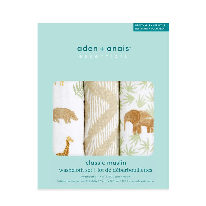 The aden + anais essential cotton muslin washcloths 3 pack is ideal for delicate skin, featuring one cloth with safari animals, one geometric, and one green leaf design. Each layer is absorbent and comes in light blue packaging detailing the product.