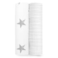 Two essentials cotton muslin swaddle blankets by aden + anais are rolled side by side; the left one has a white background with gray stars, and the right one features thin gray stripes on a white backdrop.