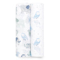 The aden + anais essentials cotton muslin swaddle blanket 2 pack includes two rolled blankets with charming animal and nature prints: one with elephants and owls, the other with owls, stars, and moons—all in soothing pastel hues for your little ones cozy comfort.