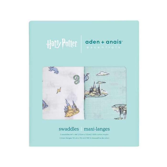 The aden + anais essentials cotton muslin swaddle blanket 2 pack is a Harry Potter-themed must-have, featuring magical symbols and castle illustrations. Both are crafted from soft cotton muslin and come in a light blue box with product details.