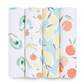 The aden + anais essentials cotton muslin swaddle blanket 4 pack includes four rolls of breathable white cotton muslin featuring vibrant fruit prints—avocados, bananas with oranges and pears, lemons, and oranges—all with slightly different background colors.