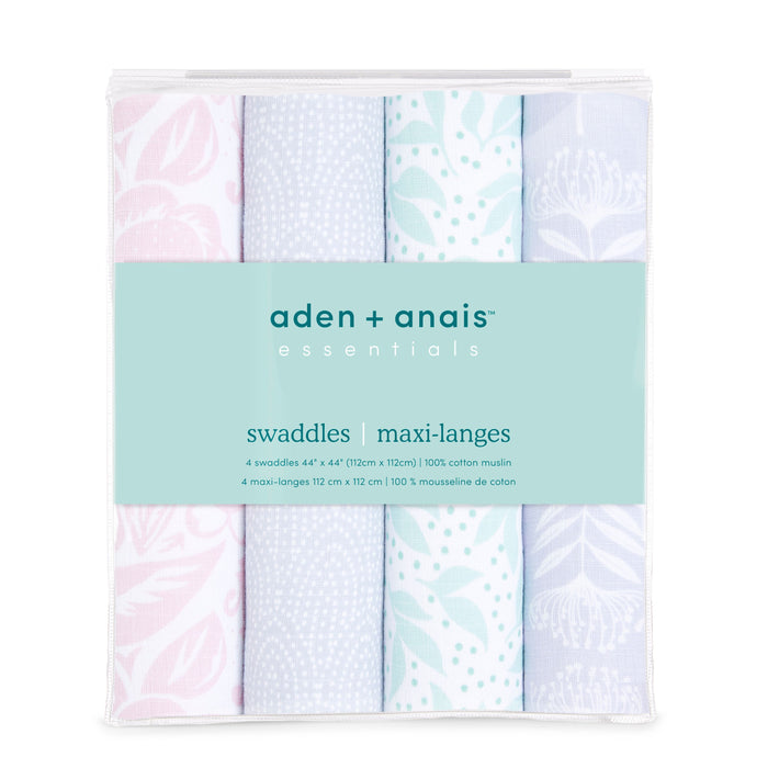 Discover the aden + anais essentials cotton muslin swaddle blanket 4 pack. Each set includes four swaddles with pastel designs like leaves, dots, and florals in pink, blue, and green hues. Transparent packaging highlights a center label for easy identification.