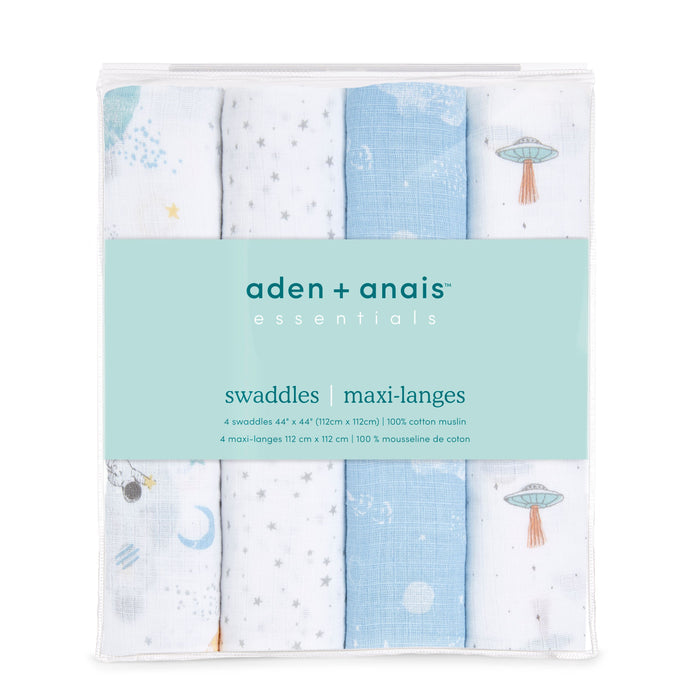 An aden + anais essentials cotton muslin swaddle blanket 4 pack includes four breathable blankets with star, moon, UFO, and planet designs. The packaging has a mint green label detailing product information.