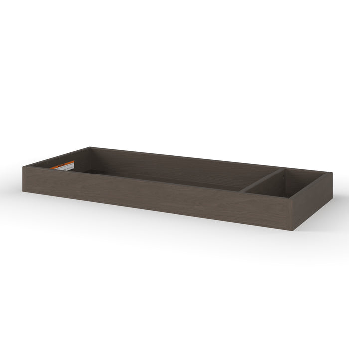 The Child Craft F01792 Universal Changing Table Topper in Dapper Gray features a rectangular design with a divider for two compartments, resembling a dresser top changing tray, and is shown against a white background.