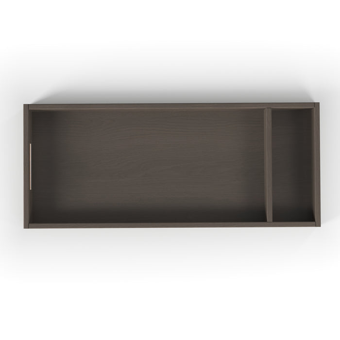 The Child Craft F01792 Universal Changing Table Topper in Dapper Gray features a rectangular design with two sections: a large left compartment and a smaller right compartment, as seen from above.