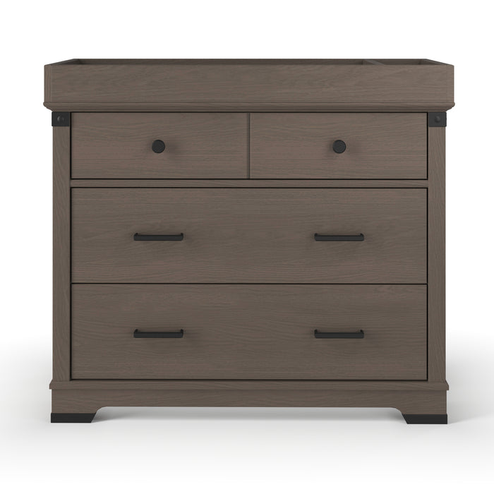 The Child Craft Universal Changing Table Topper, Dapper Gray (F01792), fits perfectly on your wooden dresser, providing a safe, convenient surface for diaper changes.