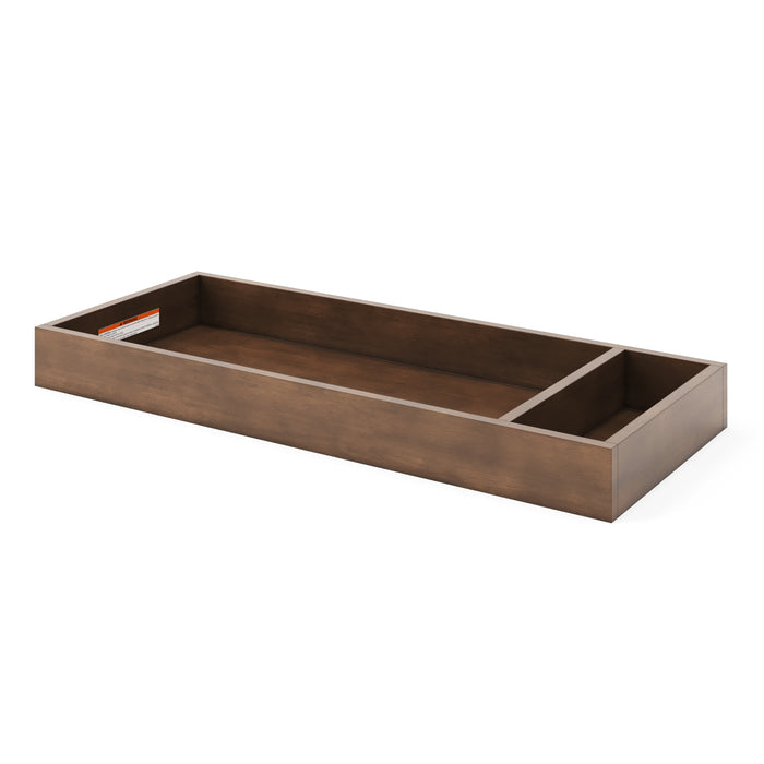 The Child Craft F01792 Universal Changing Table Topper for Dresser in Cocoa Bean offers versatile nursery storage and pairs perfectly with a rectangular wooden underbed storage drawer featuring two divided sections.