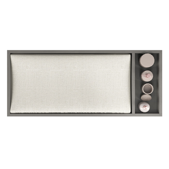 The Child Craft F01792 Universal Changing Table Topper in Lunar Gray features a large beige cushion on the left and four light pink containers on the right, creating an organized, stylish setup against a white background.