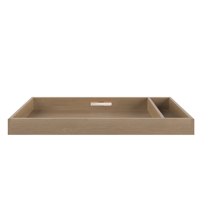 The Child Craft F01792 Universal Changing Table Topper in Nutmeg features a rectangular design with raised edges and two compartments, making it an ideal nursery accessory for safe and organized diaper changes.