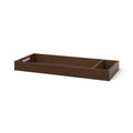 The Child Craft F01792 Universal Dressing Kit in Toasted Chestnut is a rectangular wooden baby changing tray with two compartments, one larger than the other, and features a small label on the inside edge.