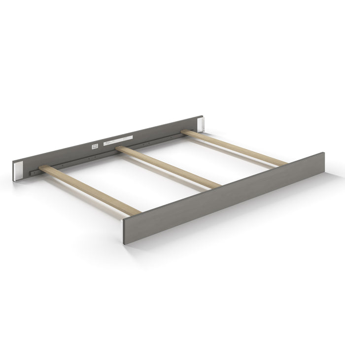 The Child Craft F06401 Full-Size Bed Rail in Lunar Gray features a metal and wood footboard with a metallic panel, three wooden support slats, and metal headboard bracket—perfect for pairing with matching bed rails or crib conversion kits.