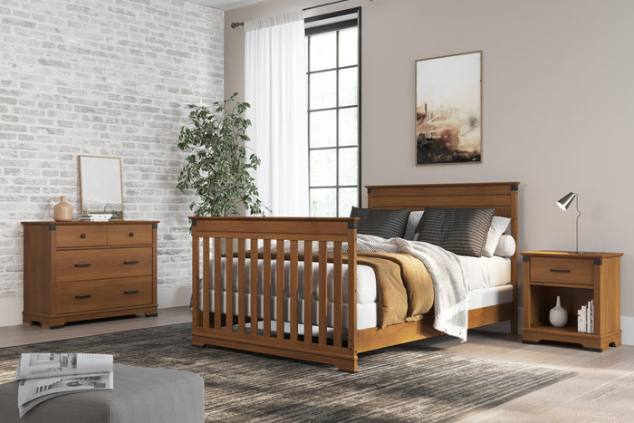 A modern bedroom showcases a wooden bed with slatted headboard/footboard, matching nightstand and dresser, gray rug, potted plant, wall art, and Child Craft F06424 Full-Size Bed Rails in Coach Cherry for added support.