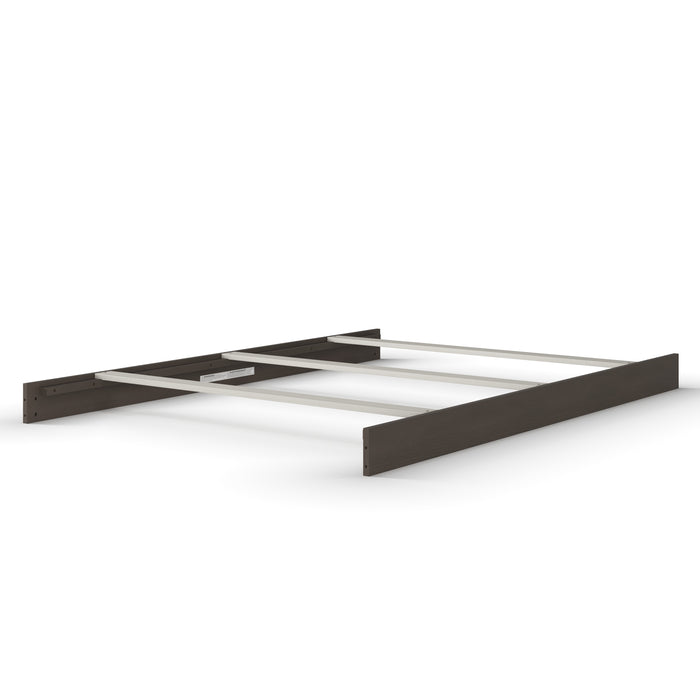 The Child Craft F06474 Full-Size Bed Rails in Dapper Gray feature sturdy metal slats and dark wood panels for stability, shown without mattress or headboard against a white background.