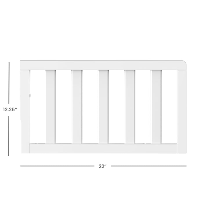Child Craft F09501 Toddler Guard Rail in matte white, measuring 12.25" tall by 22" wide, features five vertical slats and a smooth top edge. Shown from the side, it's made of sturdy wood for secure crib conversion.