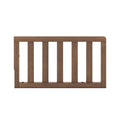 The Child Craft F09501 Toddler Guard Rail in Cocoa Bean features five vertical slats with a solid top and bottom frame, designed for easy crib conversion, shown against a white background.
