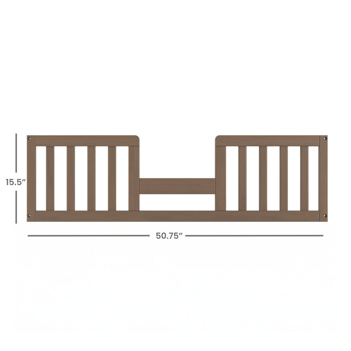 The Child Craft F09514 Toddler Guard Rail in Dusty Heather features sturdy wood construction with vertical slats, measures 15.5" tall by 50.75" wide, and is shown against a white background.