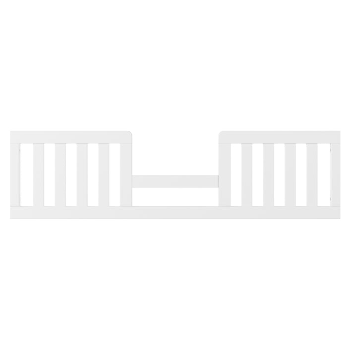 The Child Craft F09544 Toddler Guard Rail in Matte White features vertical slats, a center opening, and non-toxic finishes. Designed for crib conversion kits, it helps prevent falls while allowing easy access for your toddler.