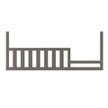 The Child Craft F09554 Toddler Guard Rail in Chelsea Grey features vertical slats and mounting holes for secure attachment to any Child Craft crib, offering added safety as a toddler bed conversion or crib guard rail.