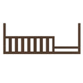 The Child Craft F09554 Toddler Guard Rail in Toasted Chestnut features vertical slats on the left and an open section on the right, designed to attach securely to a Child Craft crib for safe toddler bed conversion.