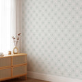 The Floral Tile wallpaper in Sea Green shown in a living room.