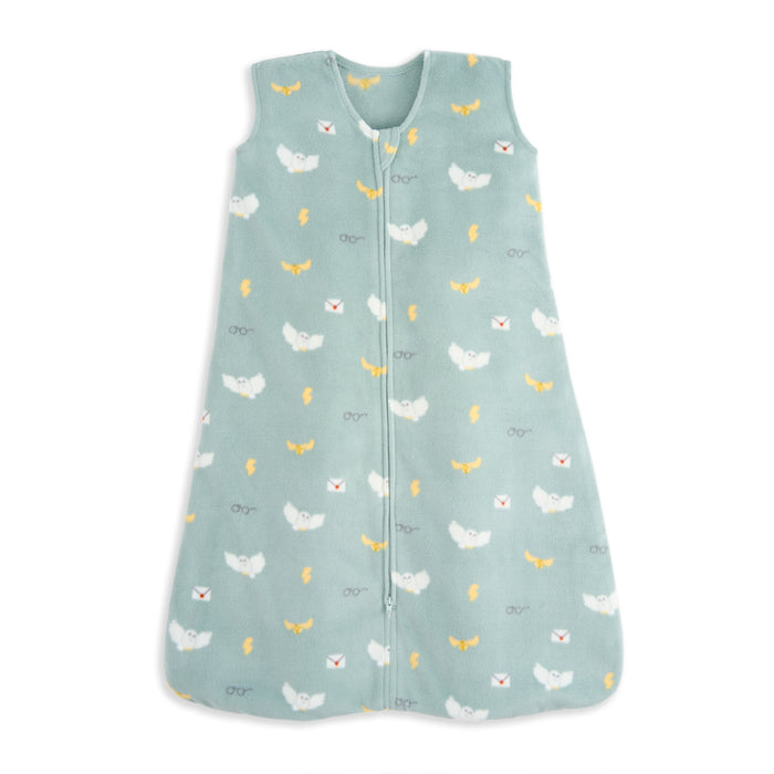 The HALO Harry Potter™ Wearable Blanket Micro-Fleece TOG 1.0 is a mint-green, sleeveless sleep sack with a front zipper and prints of white owls, yellow lightning bolts, glasses, and red-sealed envelopes—perfect for your baby.