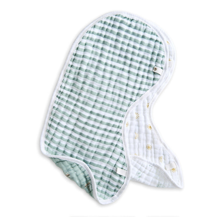 Aden + anais offers a set of two organic cotton muslin burpy bibs, crafted from soft, GOTS-certified fabric. One side boasts a green and white plaid pattern while the other features a delicate yellow floral print, expertly folded to display both charming designs.