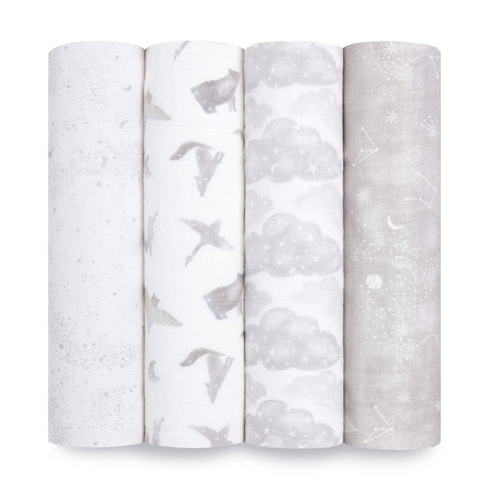 The aden + anais organic cotton muslin swaddle blanket 4 pack features GOTS-certified designs in gray and white, including stars, birds, clouds, and celestial maps with constellations and moons. Each sustainable pattern is distinctively repeated across the fabric.