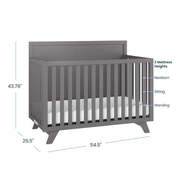 The Child Craft Soho 4-in-1 Flat Top Convertible Crib in Cool Gray features a high back panel, slatted sides, and measures 43.78"H x 29.5"D x 54.5"W. Mattress adjusts to three heights—ideal nursery furniture for growing babies.