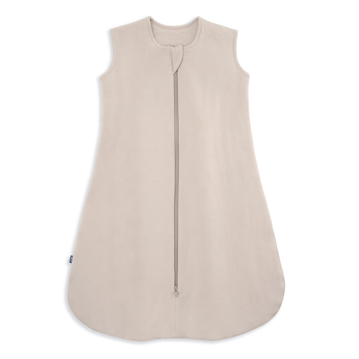 The HALO SuperSoft Bamboo Wearable Blanket TOG 1.5 is a beige, sleeveless baby sleep sack made from soft bamboo, featuring a 2-way zipper from neckline to bottom, shown on a white background.